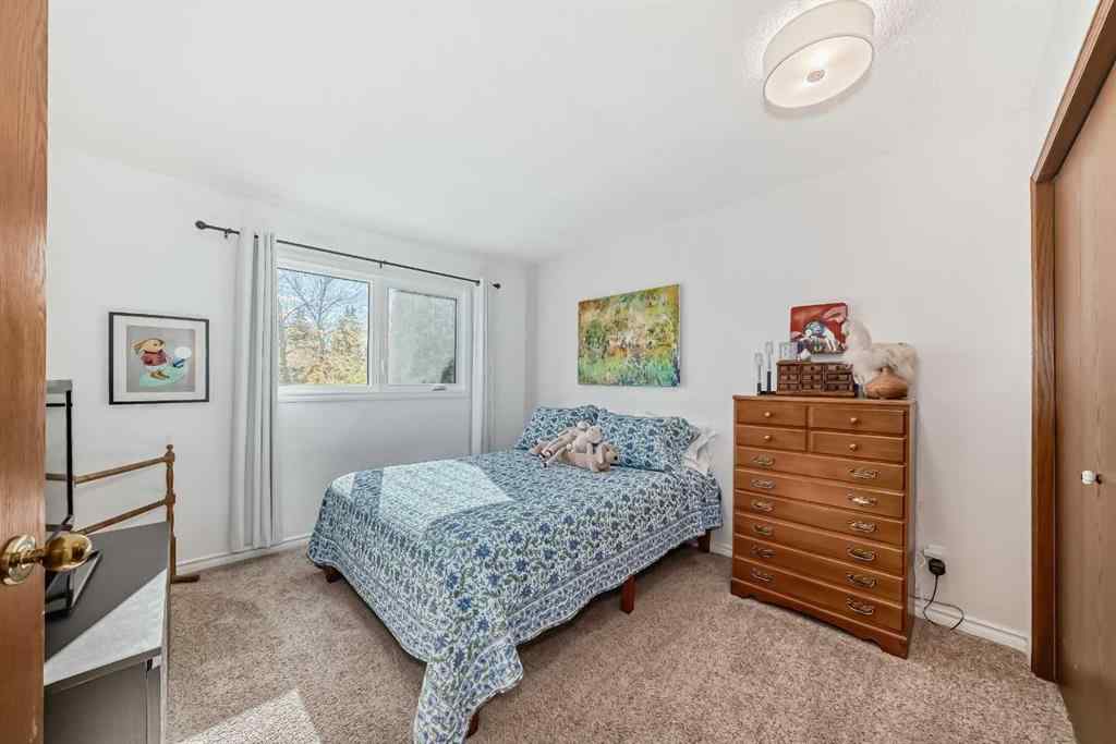 MLS® A2261675 - 164 Woodfield Road SW in Woodbine Calgary, Residential