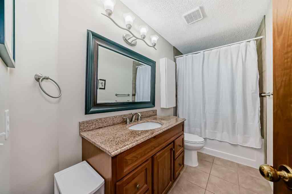 MLS® A2261675 - 164 Woodfield Road SW in Woodbine Calgary, Residential