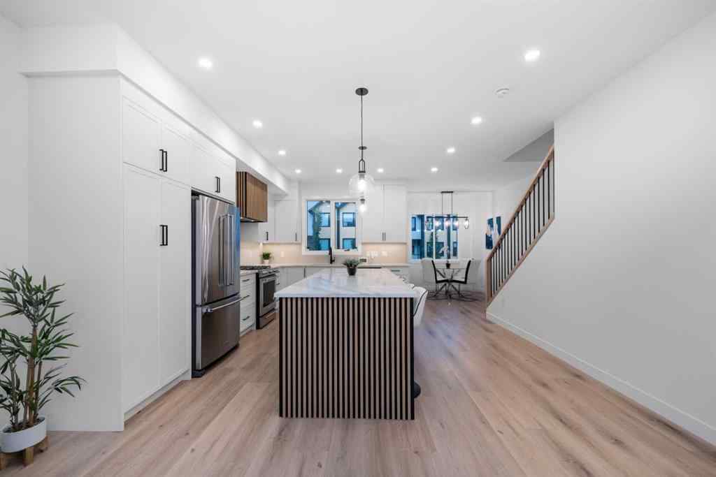 MLS® A2261684 - 97 23 Street NW in West Hillhurst Calgary, Residential