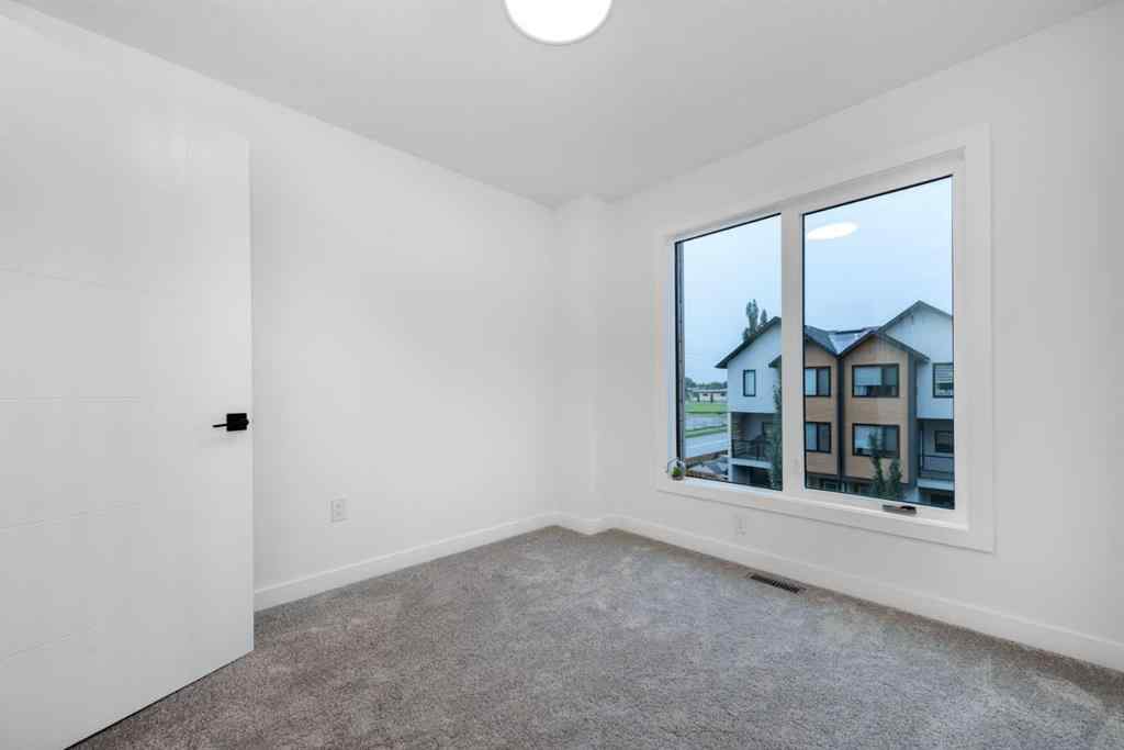 MLS® A2261684 - 97 23 Street NW in West Hillhurst Calgary, Residential