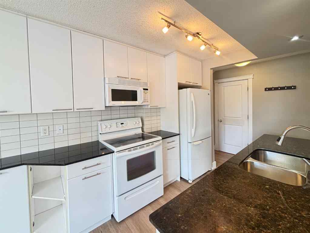 MLS® A2261694 - Unit #207 501 57 Avenue SW in Windsor Park Calgary, Residential