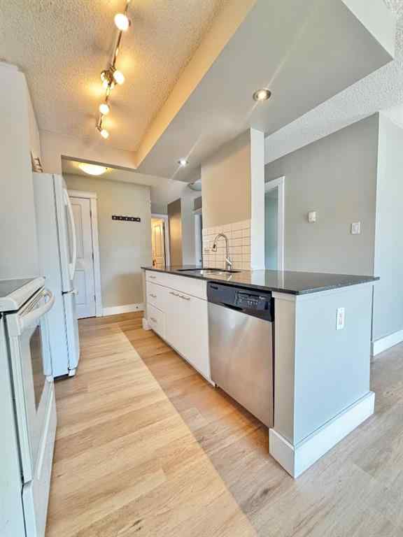 MLS® A2261694 - Unit #207 501 57 Avenue SW in Windsor Park Calgary, Residential