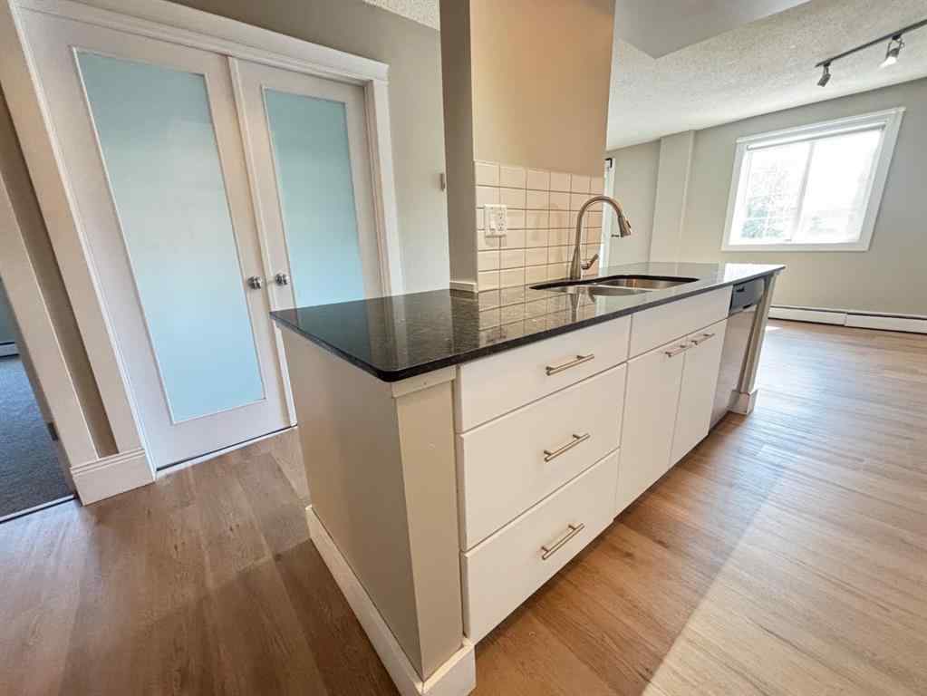 MLS® A2261694 - Unit #207 501 57 Avenue SW in Windsor Park Calgary, Residential