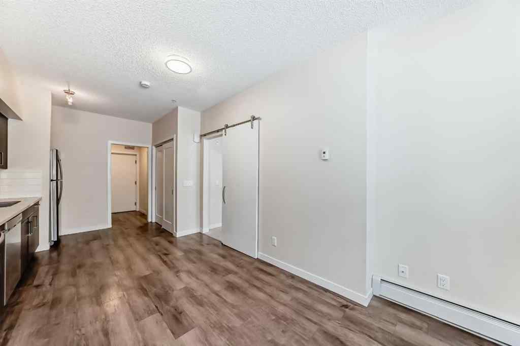 MLS® A2261702 - Unit #108 7 Westpark Common SW in West Springs Calgary, Residential
