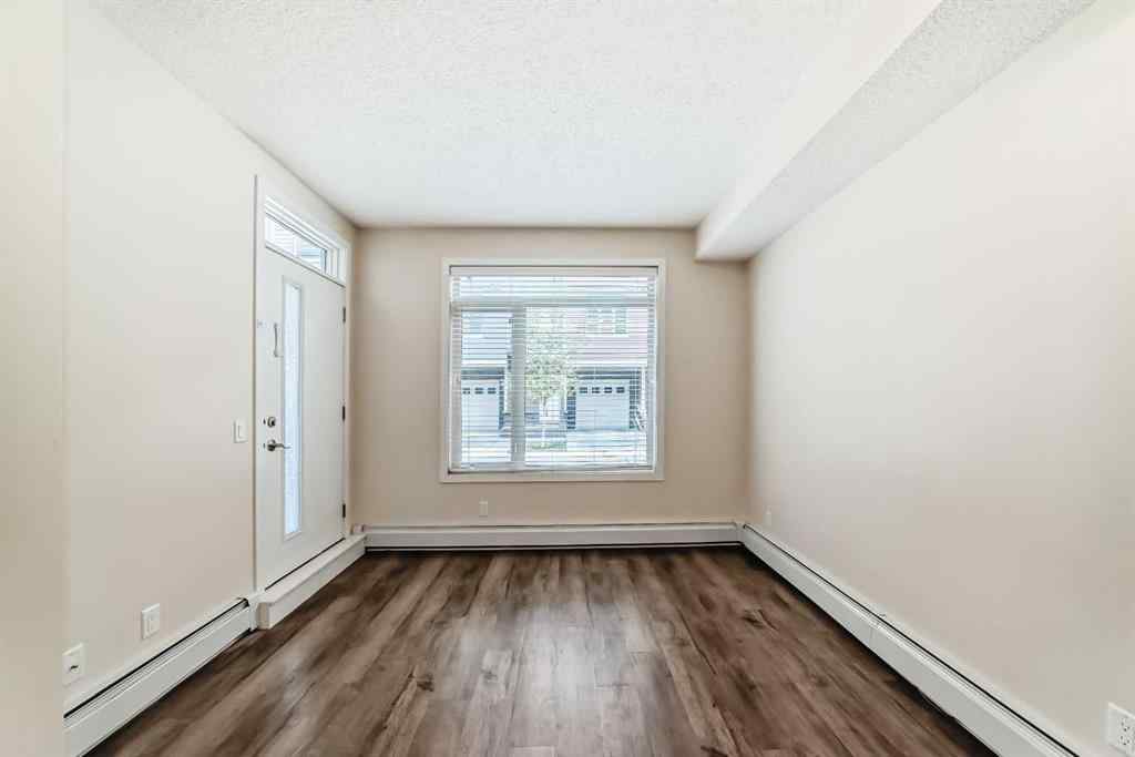 MLS® A2261702 - Unit #108 7 Westpark Common SW in West Springs Calgary, Residential