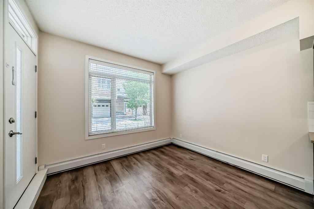 MLS® A2261702 - Unit #108 7 Westpark Common SW in West Springs Calgary, Residential