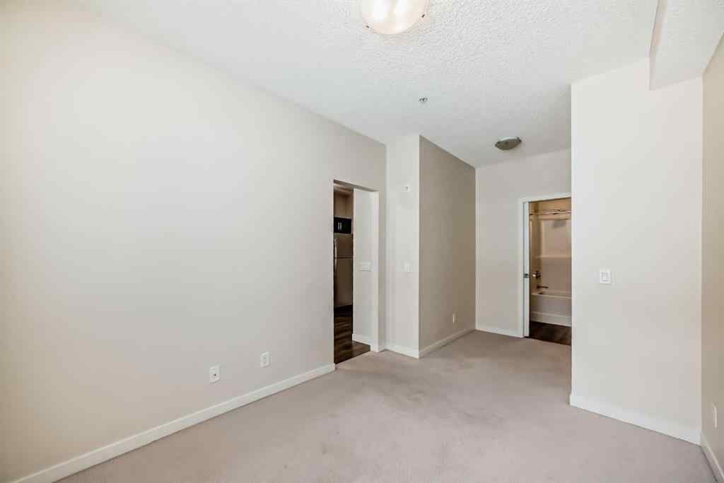 MLS® A2261702 - Unit #108 7 Westpark Common SW in West Springs Calgary, Residential