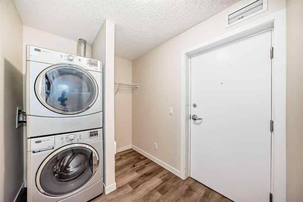MLS® A2261702 - Unit #108 7 Westpark Common SW in West Springs Calgary, Residential
