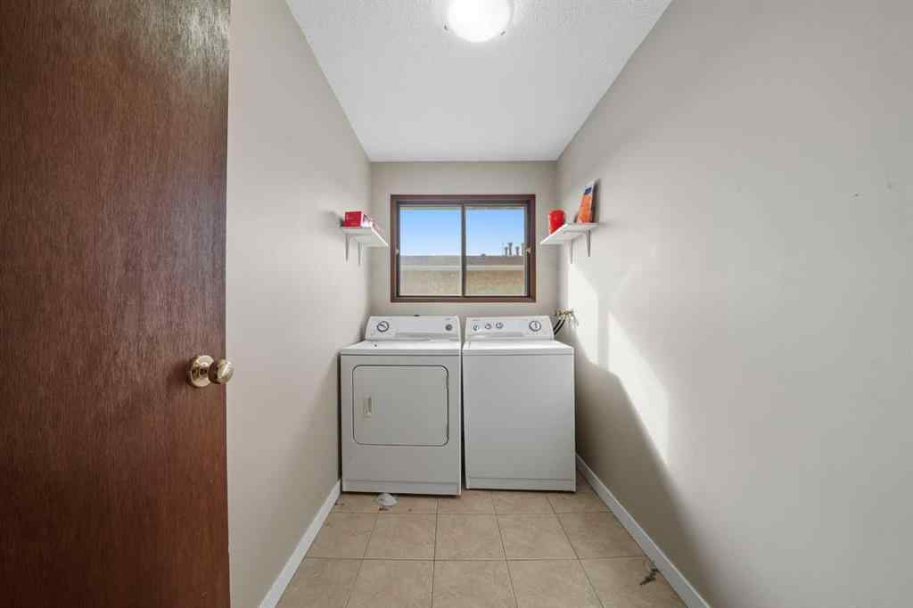 MLS® A2261719 - 27 Nyberg Avenue  in Normandeau Red Deer, Multi-Family