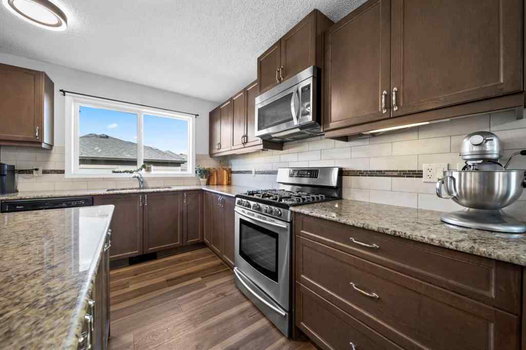 MLS® A2261738 - 1218 Kings Heights Way SE in Kings Heights Airdrie, Residential