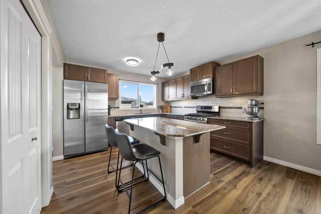 MLS® A2261738 - 1218 Kings Heights Way SE in Kings Heights Airdrie, Residential