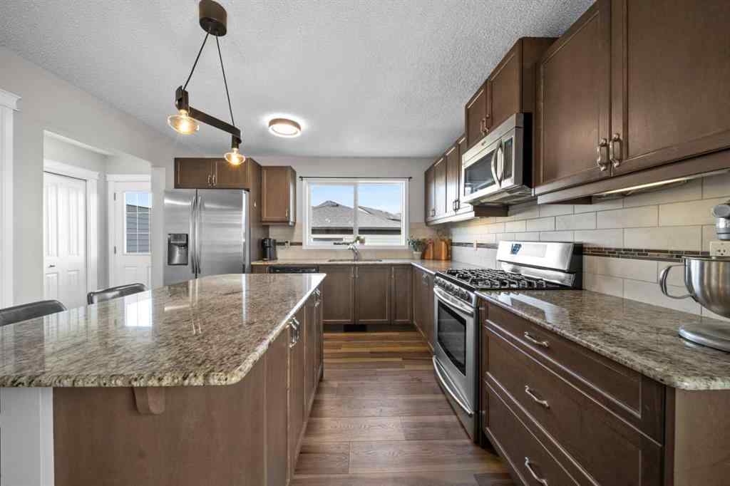 MLS® A2261738 - 1218 Kings Heights Way SE in Kings Heights Airdrie, Residential
