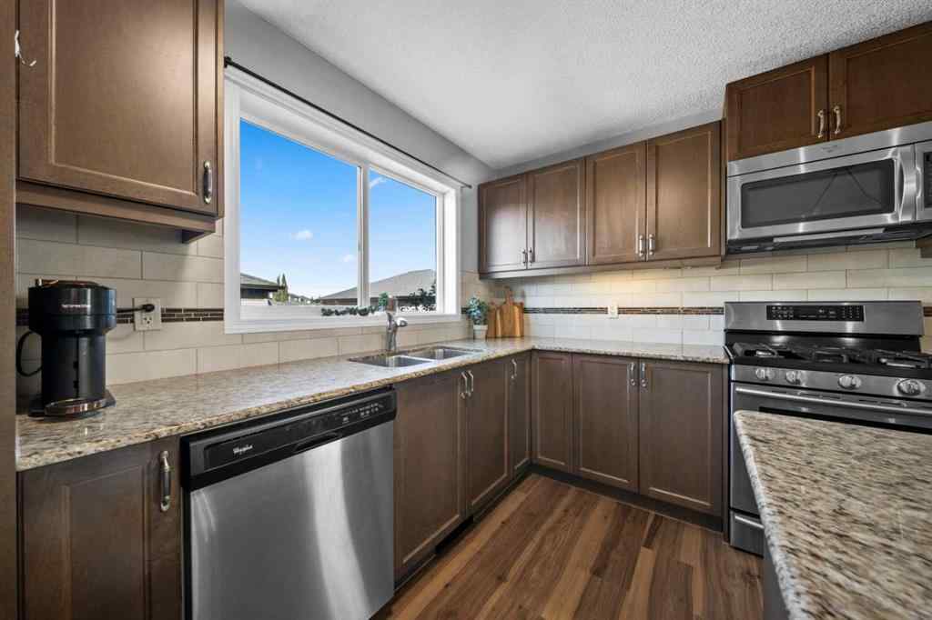 MLS® A2261738 - 1218 Kings Heights Way SE in Kings Heights Airdrie, Residential