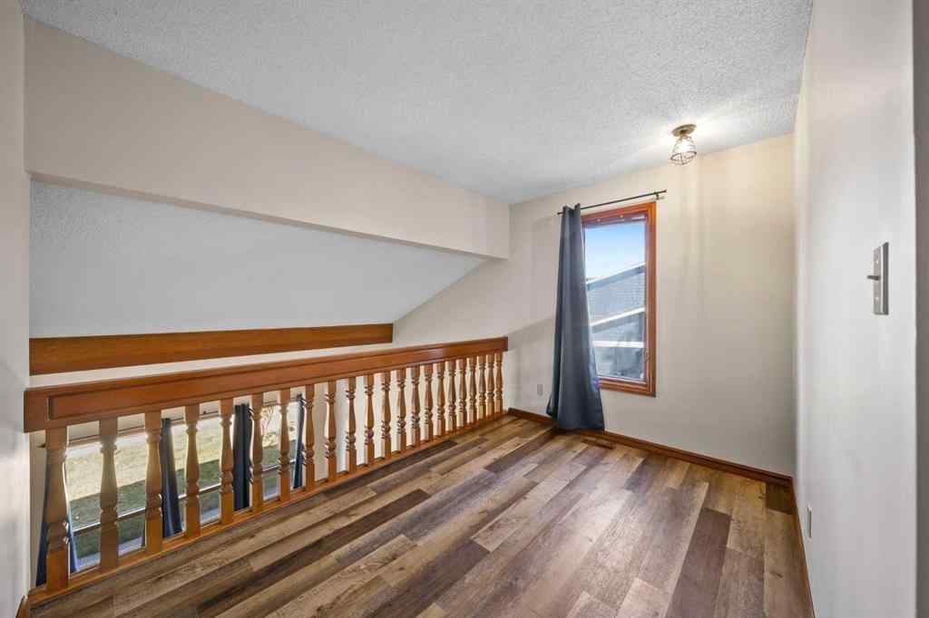 MLS® A2261749 - 36 Strathlorne Crescent SW in Strathcona Park Calgary, Residential
