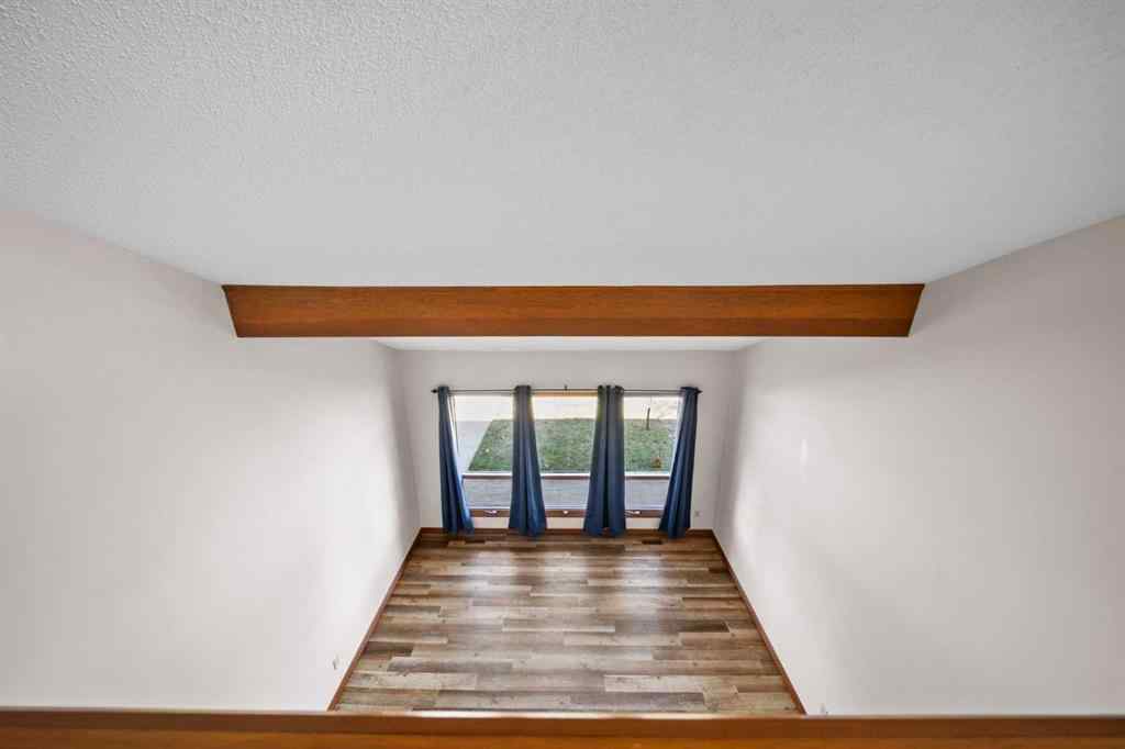 MLS® A2261749 - 36 Strathlorne Crescent SW in Strathcona Park Calgary, Residential