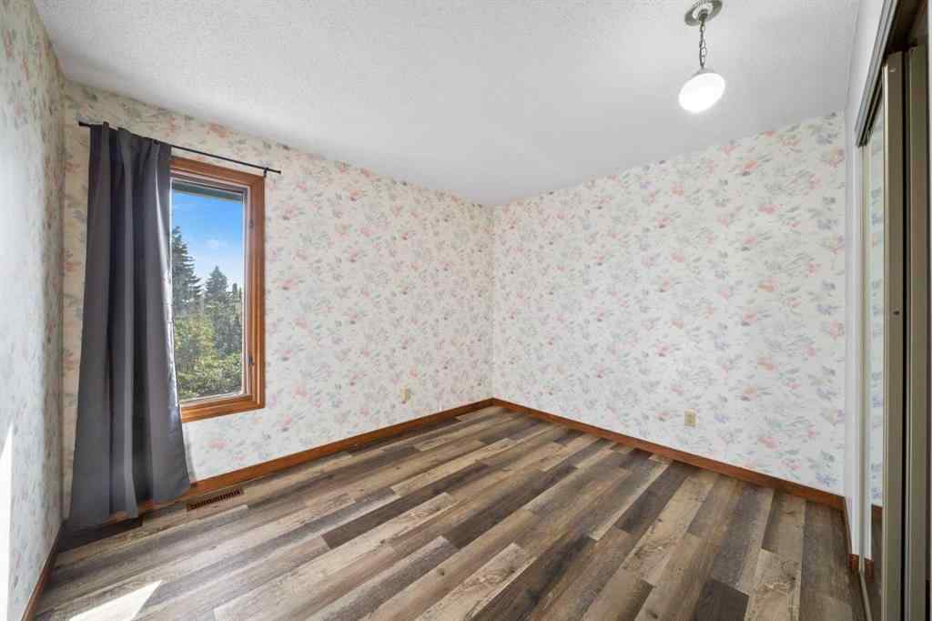 MLS® A2261749 - 36 Strathlorne Crescent SW in Strathcona Park Calgary, Residential