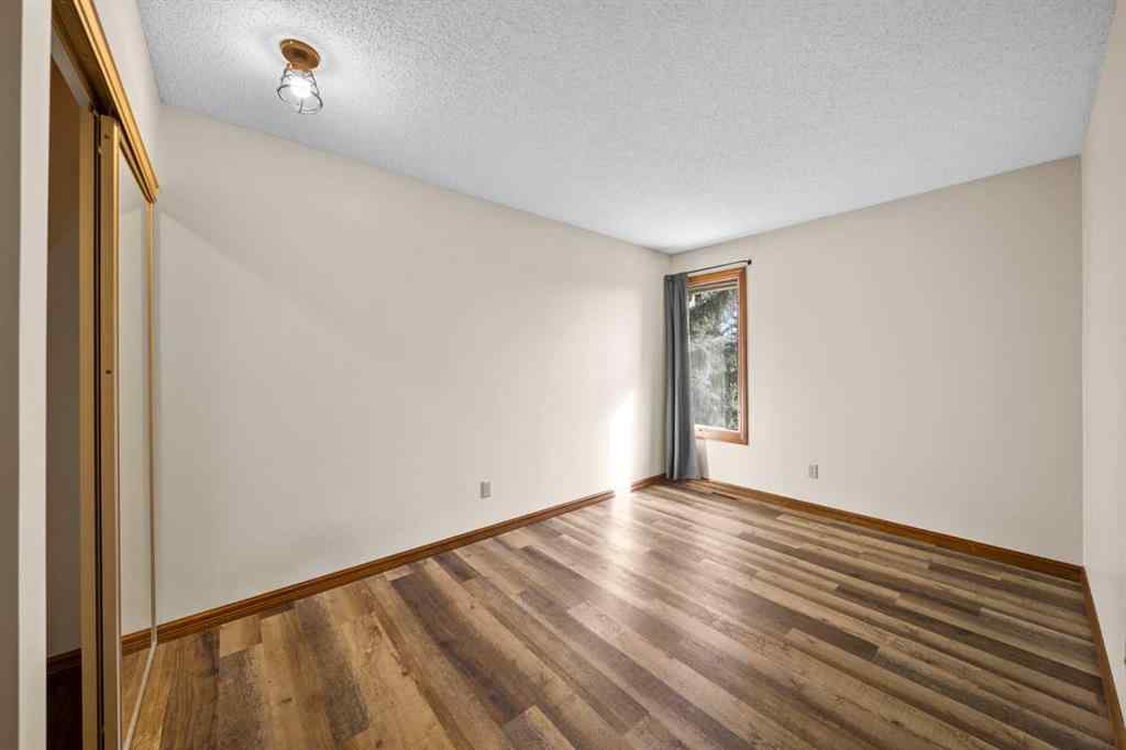 MLS® A2261749 - 36 Strathlorne Crescent SW in Strathcona Park Calgary, Residential