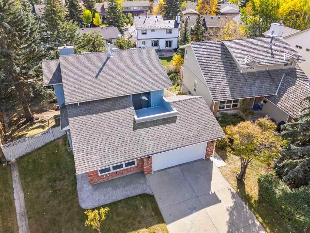 MLS® A2261749 - 36 Strathlorne Crescent SW in Strathcona Park Calgary, Residential