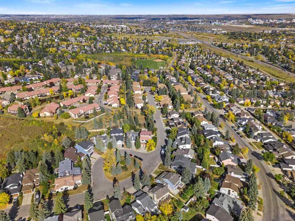 MLS® A2261749 - 36 Strathlorne Crescent SW in Strathcona Park Calgary, Residential
