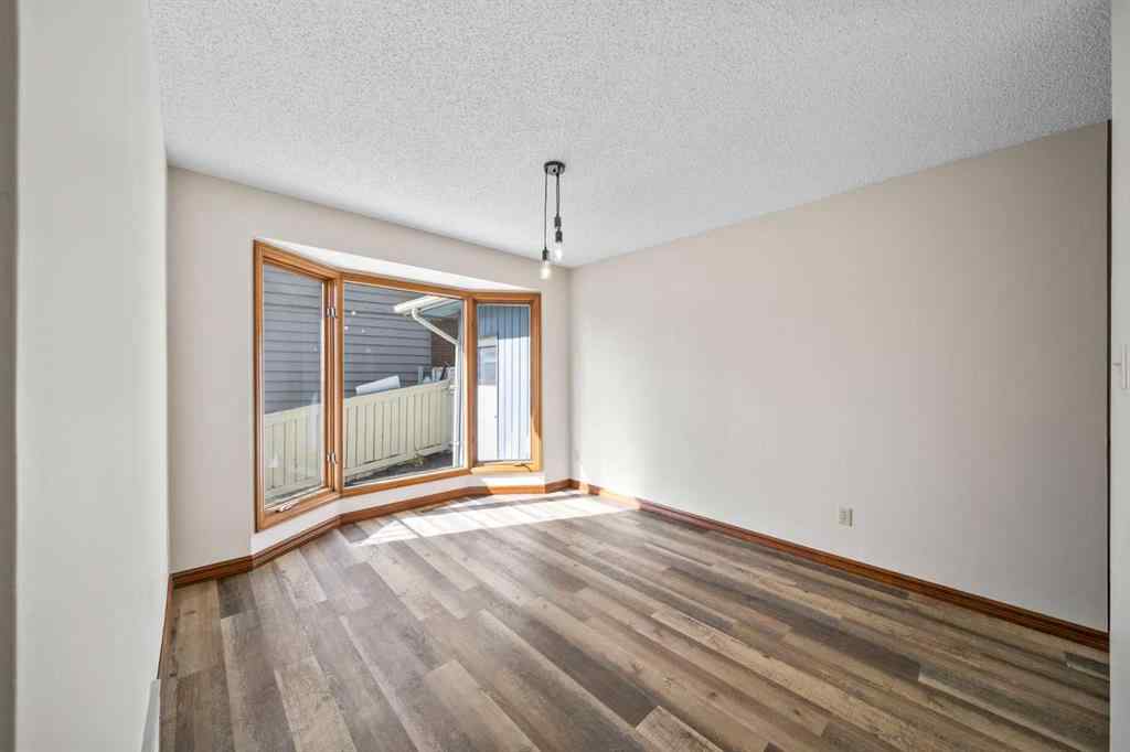 MLS® A2261749 - 36 Strathlorne Crescent SW in Strathcona Park Calgary, Residential