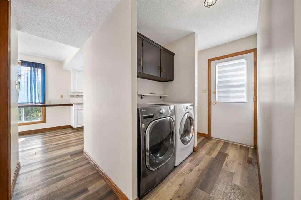 MLS® A2261749 - 36 Strathlorne Crescent SW in Strathcona Park Calgary, Residential