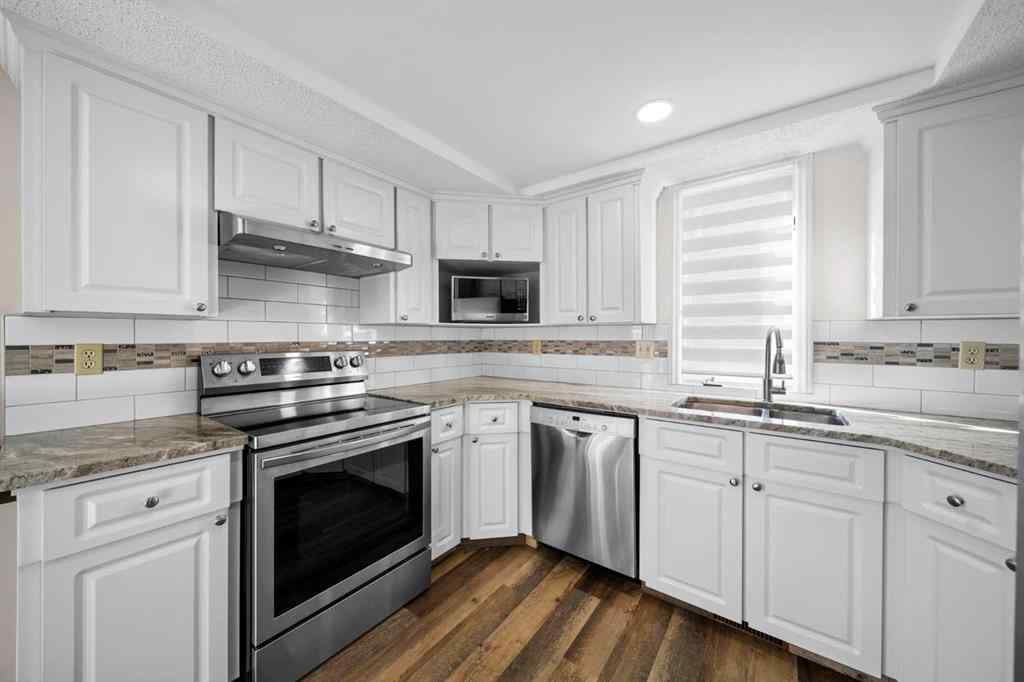 MLS® A2261749 - 36 Strathlorne Crescent SW in Strathcona Park Calgary, Residential