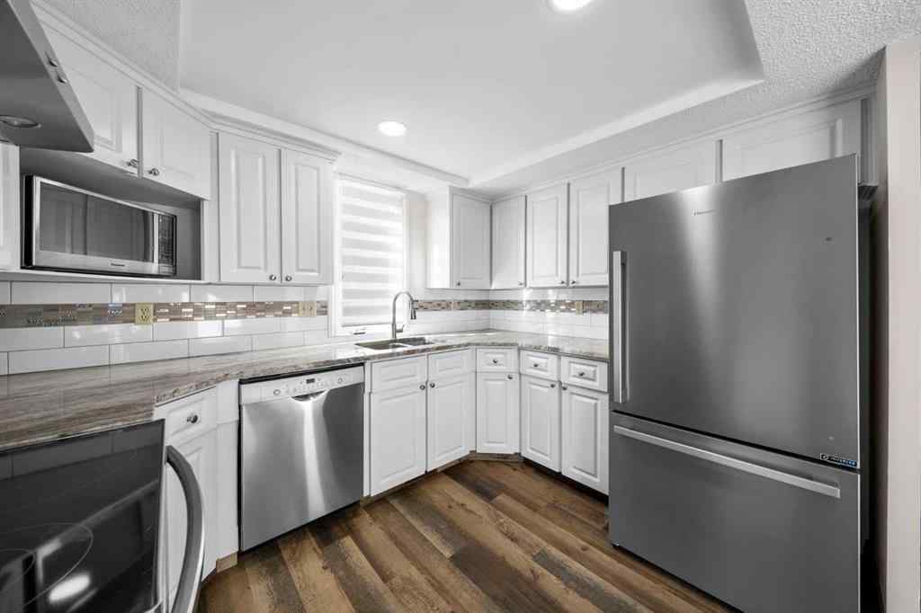 MLS® A2261749 - 36 Strathlorne Crescent SW in Strathcona Park Calgary, Residential