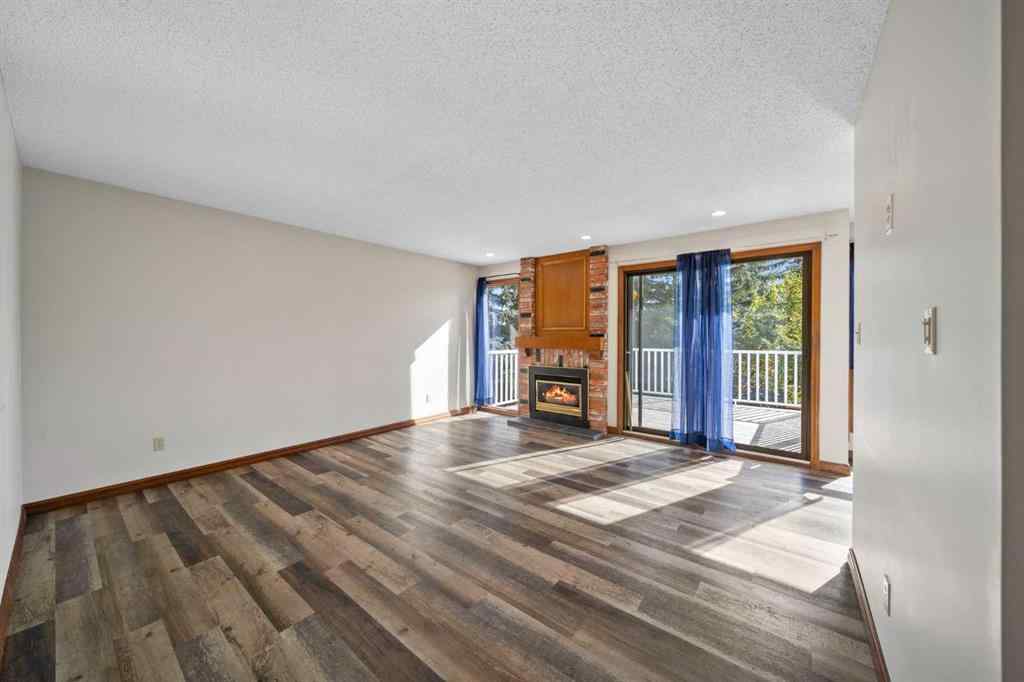 MLS® A2261749 - 36 Strathlorne Crescent SW in Strathcona Park Calgary, Residential