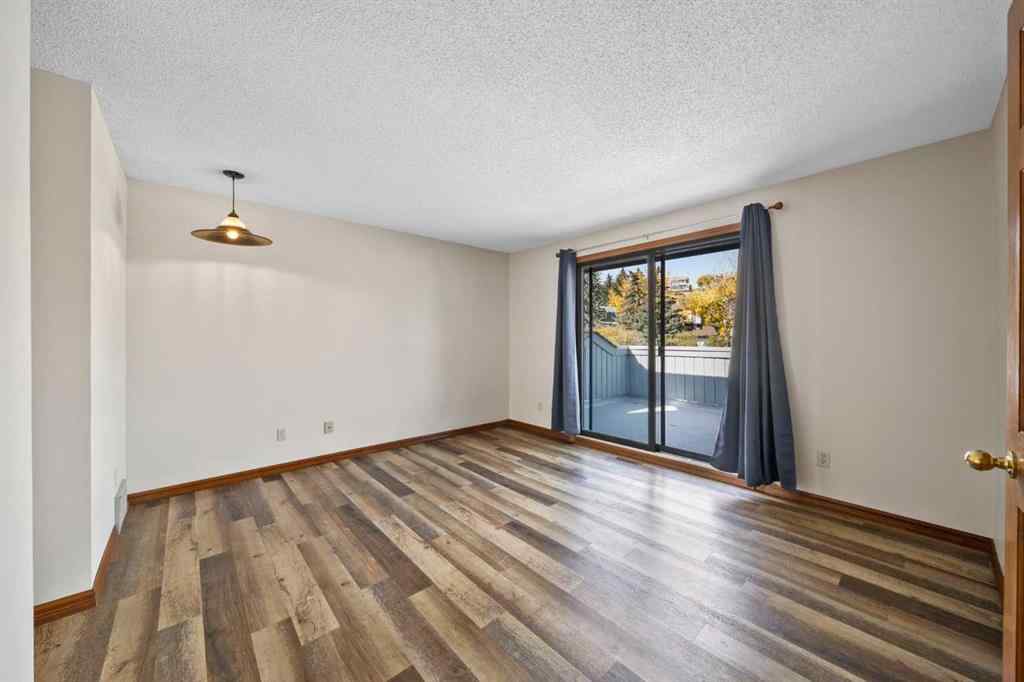MLS® A2261749 - 36 Strathlorne Crescent SW in Strathcona Park Calgary, Residential