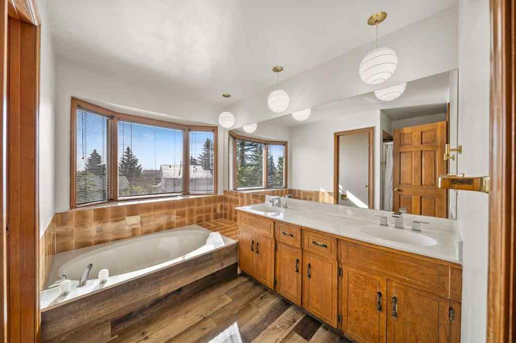 MLS® A2261749 - 36 Strathlorne Crescent SW in Strathcona Park Calgary, Residential