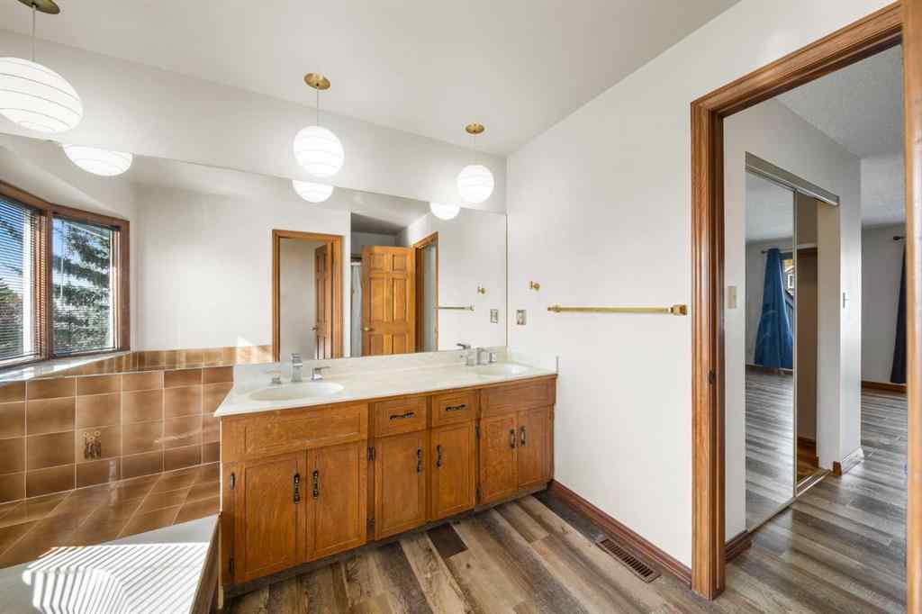 MLS® A2261749 - 36 Strathlorne Crescent SW in Strathcona Park Calgary, Residential