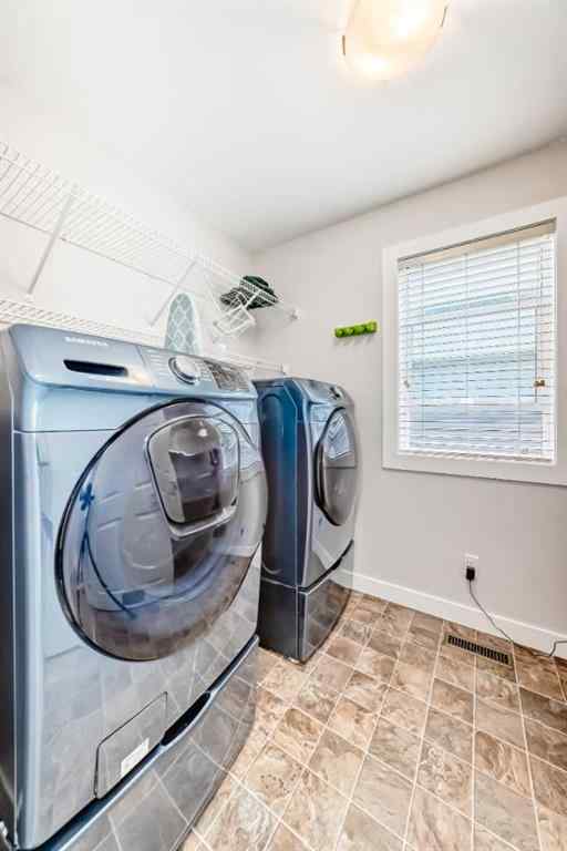 MLS® A2261753 - 210 Copperleaf Bay SE in Copperfield Calgary, Residential