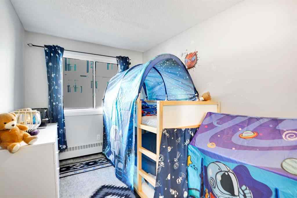 MLS® A2261771 - Unit #109 110 20 Avenue NE in Tuxedo Park Calgary, Residential