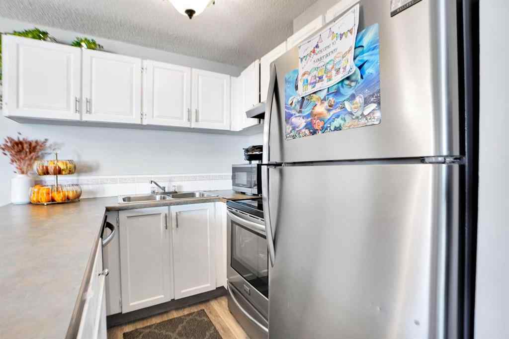 MLS® A2261771 - Unit #109 110 20 Avenue NE in Tuxedo Park Calgary, Residential