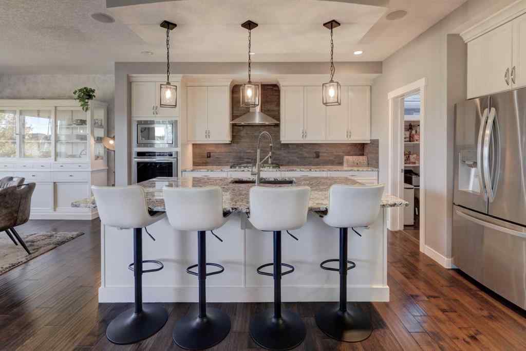 MLS® A2261816 - 213 Kingsmere Cove SE in Kings Heights Airdrie, Residential