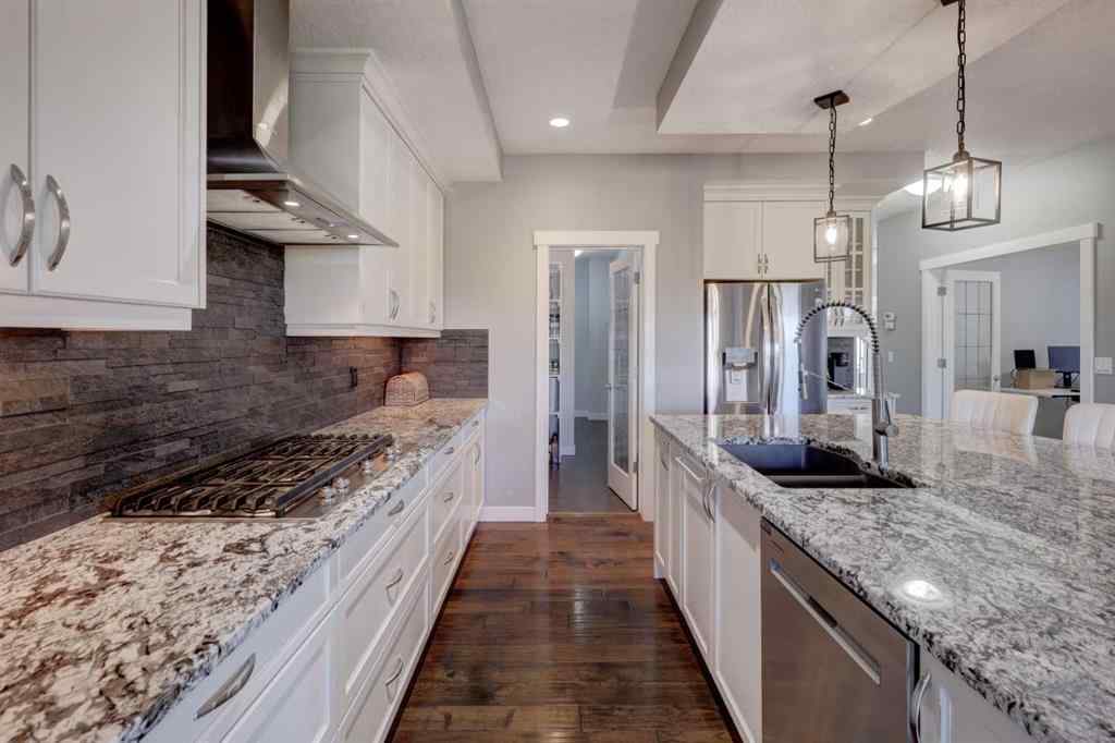 MLS® A2261816 - 213 Kingsmere Cove SE in Kings Heights Airdrie, Residential