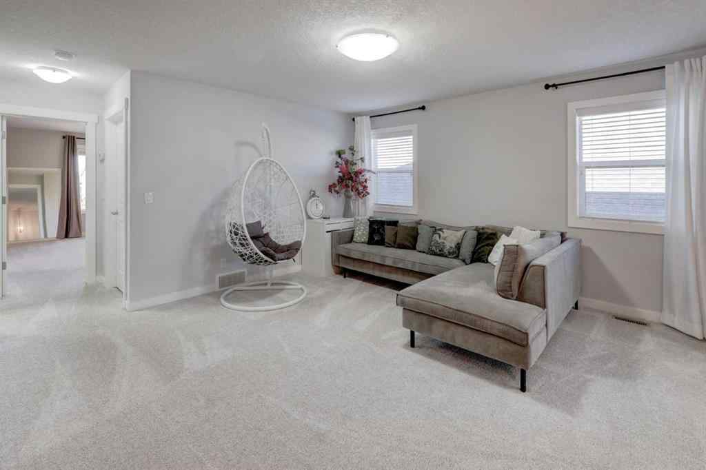 MLS® A2261816 - 213 Kingsmere Cove SE in Kings Heights Airdrie, Residential