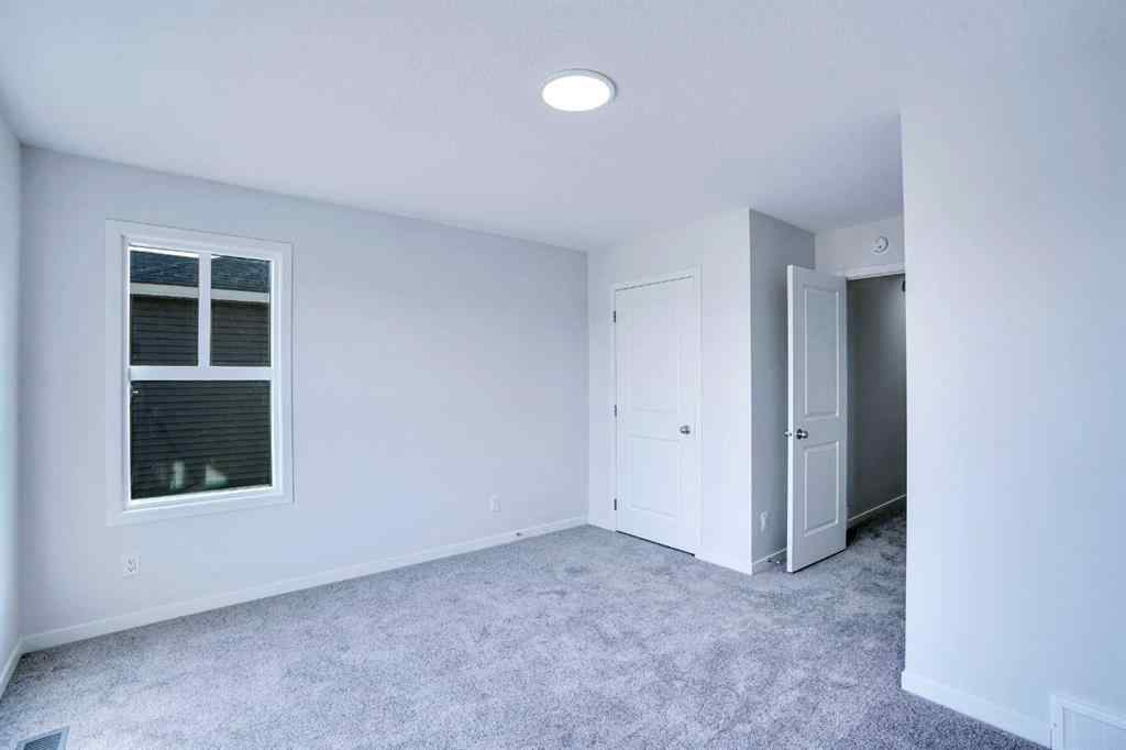 MLS® A2261867 - 312 Edith Place NW in Glacier Ridge Calgary, Residential