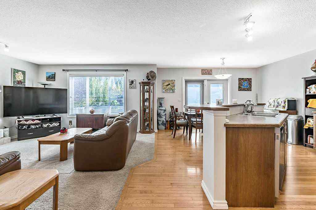 MLS® A2261880 - 54 Cimarron Trail  in Cimarron Okotoks, Residential