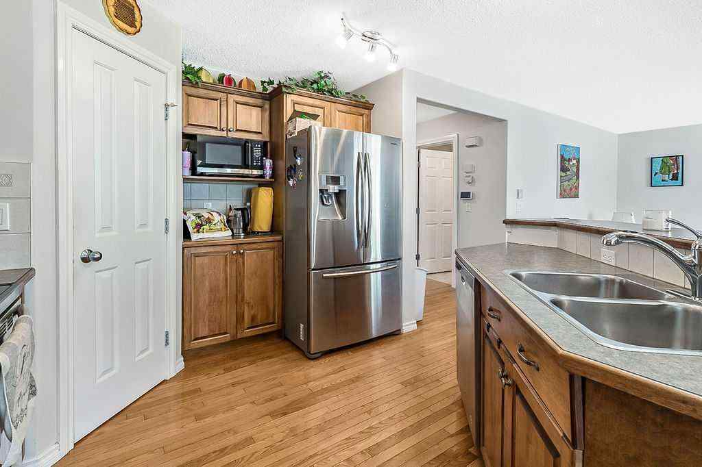 MLS® A2261880 - 54 Cimarron Trail  in Cimarron Okotoks, Residential