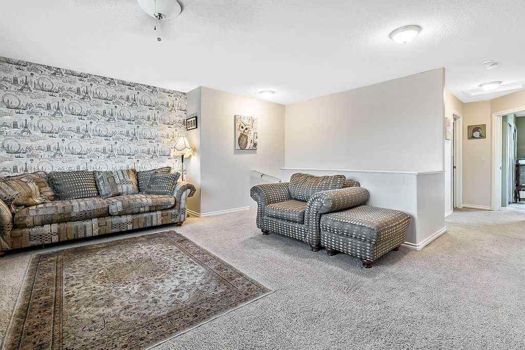 MLS® A2261880 - 54 Cimarron Trail  in Cimarron Okotoks, Residential