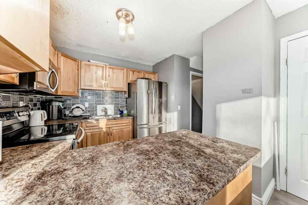 MLS® A2261885 - Unit #61 4769 HUBALTA Road SE in Dover Calgary, Residential