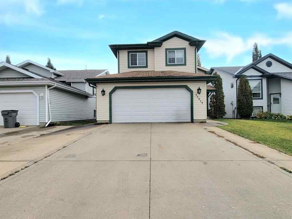 MLS® A2261891 - 11317 92B Street  in Summit Grande Prairie, Residential