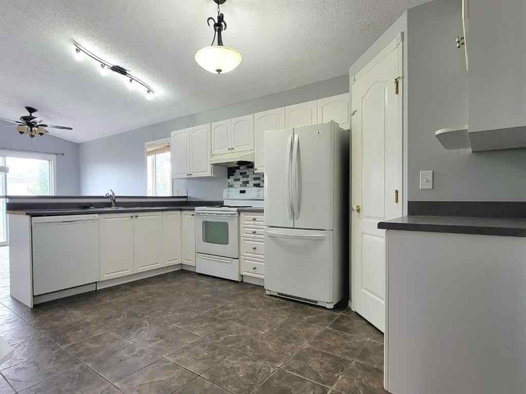 MLS® A2261891 - 11317 92B Street  in Summit Grande Prairie, Residential