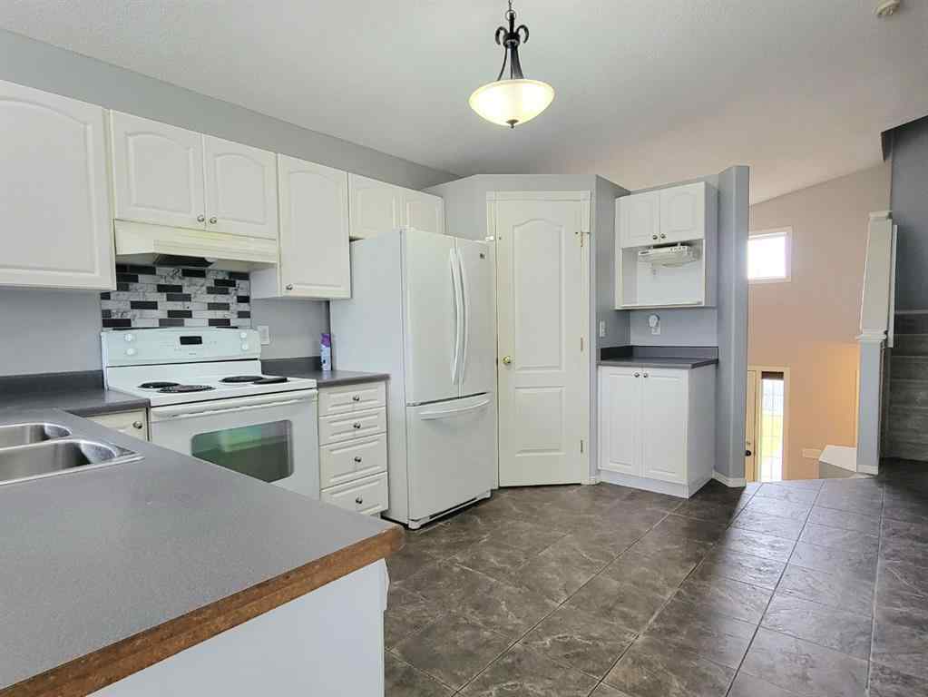 MLS® A2261891 - 11317 92B Street  in Summit Grande Prairie, Residential