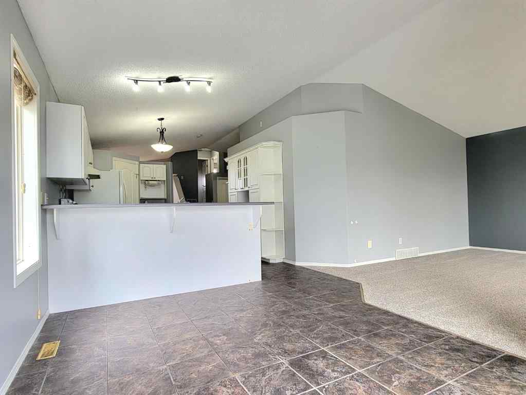 MLS® A2261891 - 11317 92B Street  in Summit Grande Prairie, Residential