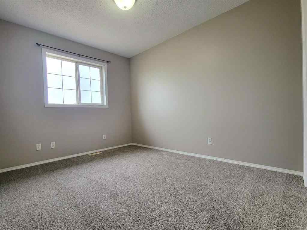 MLS® A2261891 - 11317 92B Street  in Summit Grande Prairie, Residential