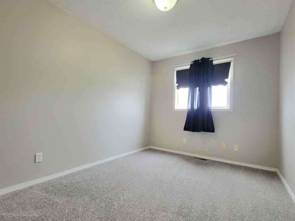 MLS® A2261891 - 11317 92B Street  in Summit Grande Prairie, Residential