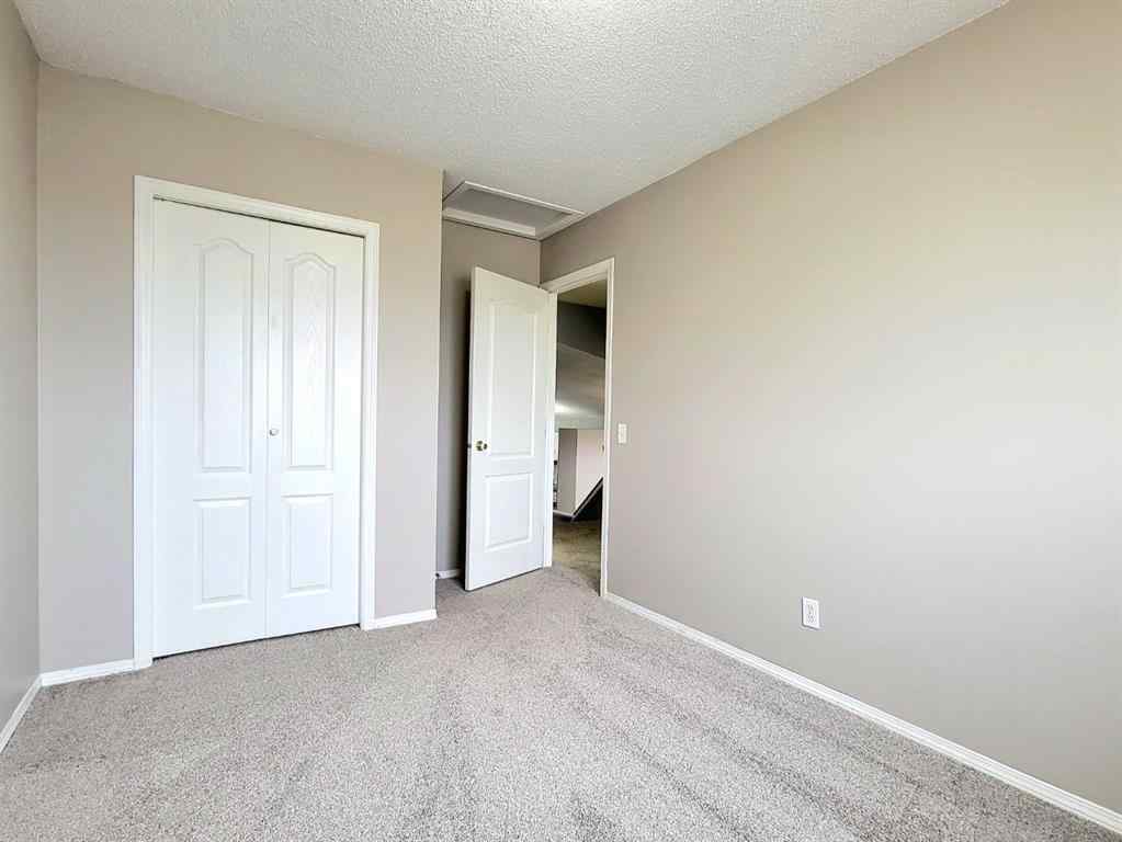 MLS® A2261891 - 11317 92B Street  in Summit Grande Prairie, Residential