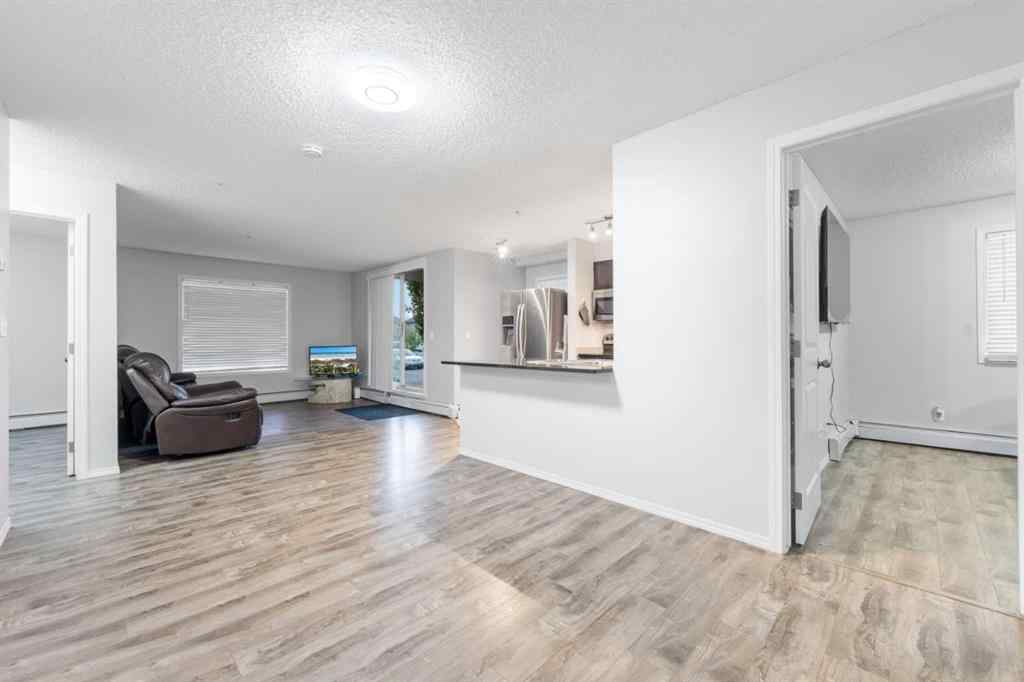 MLS® A2261898 - Unit #102 15 Saddlestone Way NE in Saddle Ridge Calgary, Residential